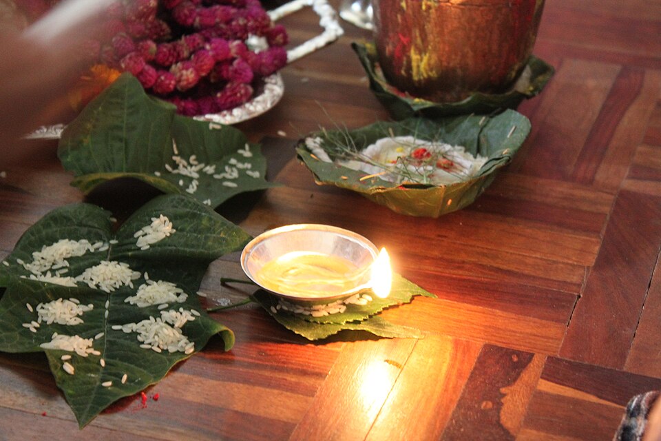 Oil lamps and flowers prepared for Tihar puja